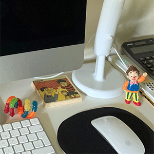 Mr Tumble toy on Xander's desk