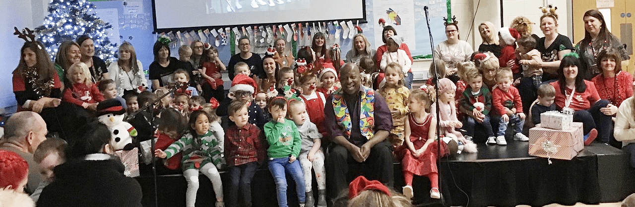 Pupils and staff with Dave Benson Phillips