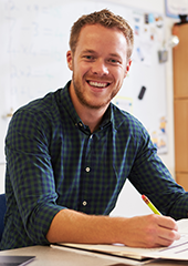 Young man sitting at a desk