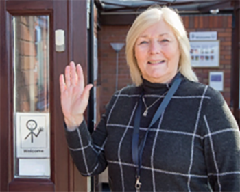 Woman signing Hello